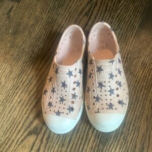 Natives size C12 girls shoes.